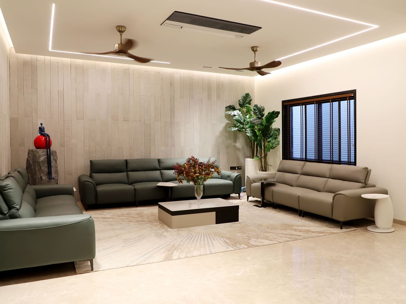 Warm neutral living room with layered seating and a timber ceiling